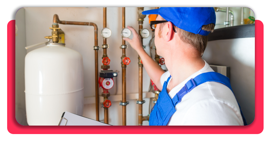 Técnico cualificado realizando la revisión y mantenimiento preventivo completo de una instalación doméstica de gas natural en España.